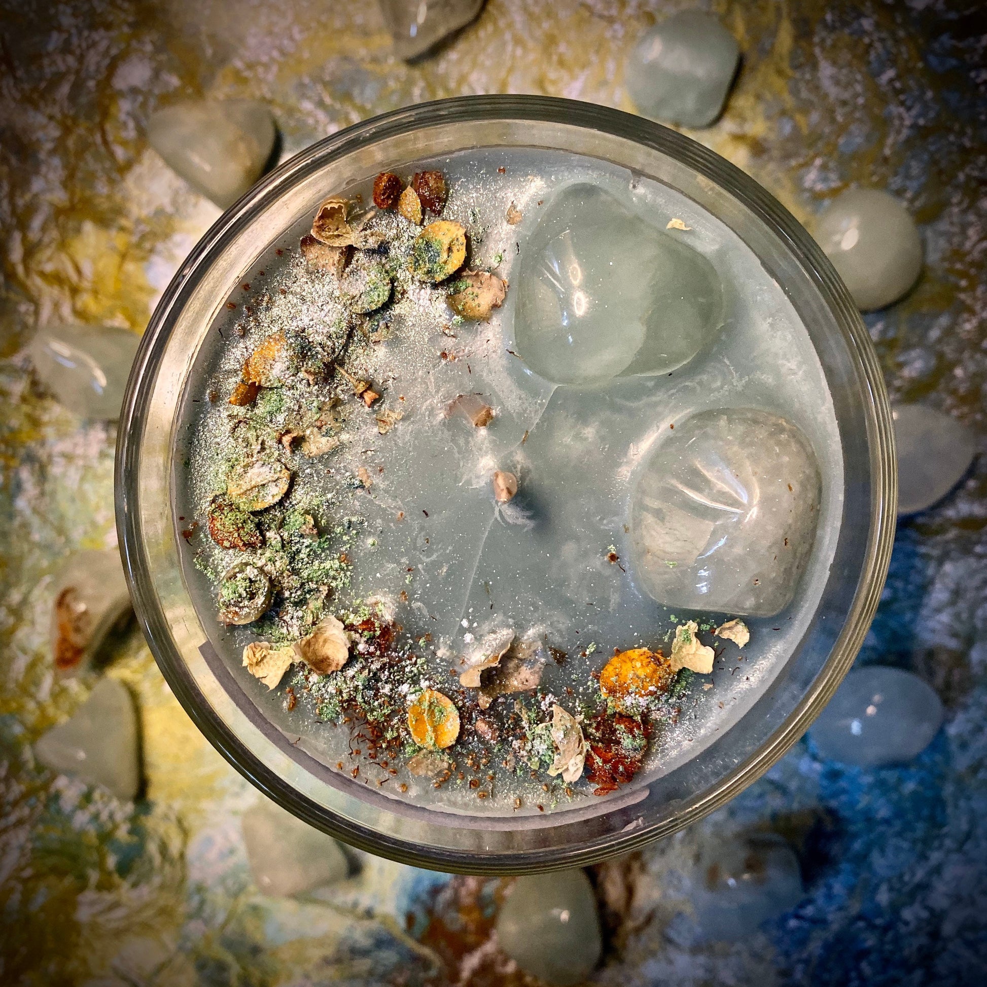 Autumn Walks candle with dried flowers and prehnite crystals